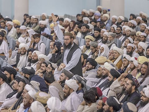 People attend the Taliban’s Preaching and Guidance Commission public event in Kabul, Afghanistan on Monday, August 23, 2021.