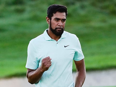 Tony Finau celebrates after winning The Northern Trust at Liberty National Golf Course