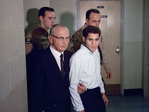This June 1968 file photo shows Sirhan Sirhan, right, then the accused assassin of Sen. Robert F. Kennedy, with his attorney Russell E. Parsons in Los Angeles.