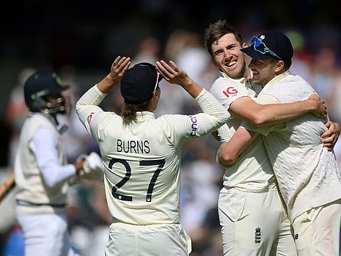 England's pacer Craig Overton celebrates the last wicket of India to win the Test at Headingley