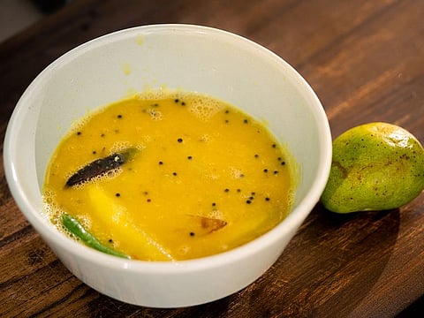 A sweet and sour Bengali dal with green mangoes