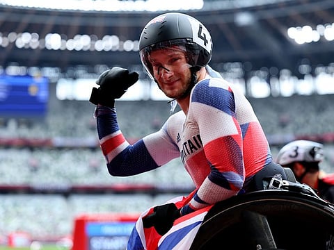 Andrew Small of Britain celebrates winning the gold medal.