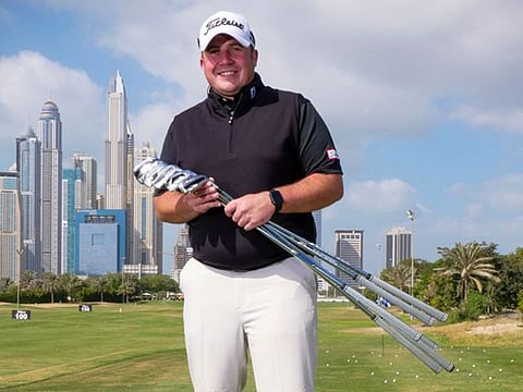 Stuart Taylor on the driving range at Emirates Golf Club in Dubai