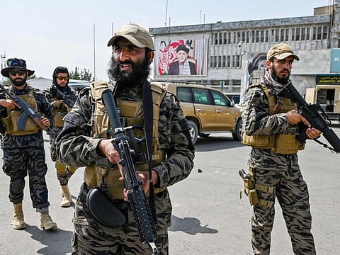 Taliban Badri special force fighters arrive at the airport in Kabul on August 31, 2021, after the US has pulled all its troops out of the country to end a brutal 20-year war.