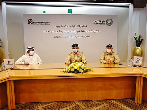 Officials during the signing ceremony at the headquarters of the General Department of Logistics Support at Dubai Police recently.