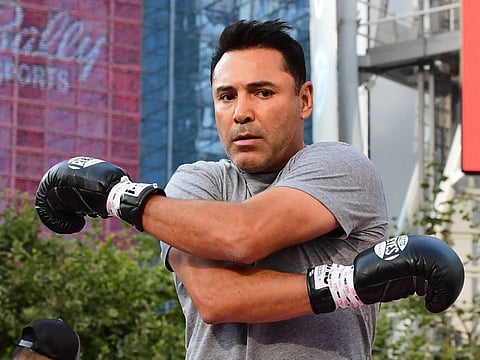 Former boxing great Oscar De La Hoya has been hospitalised after contracting COVID-19, forcing cancellation of his one-off comeback bout against Vitor Belfort next week.