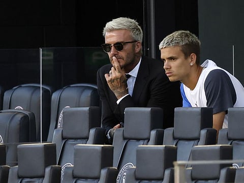 David Beckham's son Romeo looks set to follow in his father's footsteps after signing his first professional football contract.