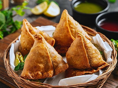 Samosas - pockets of meat or vegetable filling cooked inside a blanket of deep-fried pastry - are a mainstay of Indian snack cuisine.