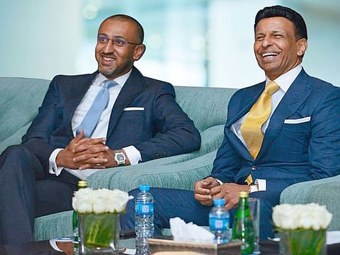 GEMS Education CEO Dino Varkey with his father and the group founder and chairman Sunny Varkey.