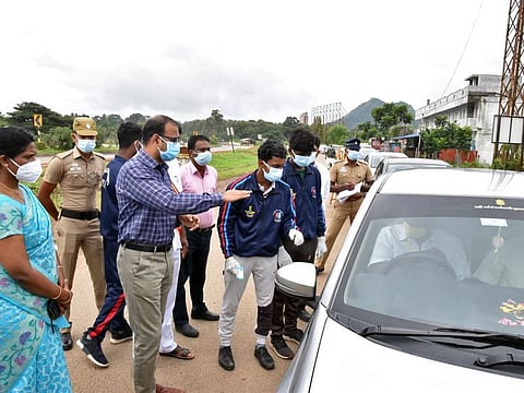 District Collector Dr. G.S. Sameeran inspects a camp at Walayar Check Post following a Nipah virus scare, in Coimbatore on Monday.
