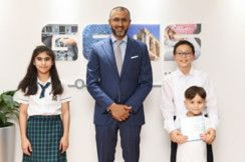 Student author Diaco Taaeb with GEMS CEO Dino Varkey and others on the occasion of International Literacy Day