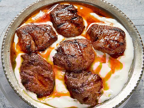 Turkish cuisine: Alinazek Kebab is a rich meaty dish with a smoky eggplant base.