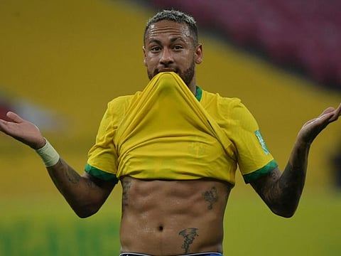 Brazil's Neymar celebrates after scoring against Peru during the South American qualification football match for the FIFA World Cup Qatar 2022 at the Pernambuco Arena in Recife, Brazil.