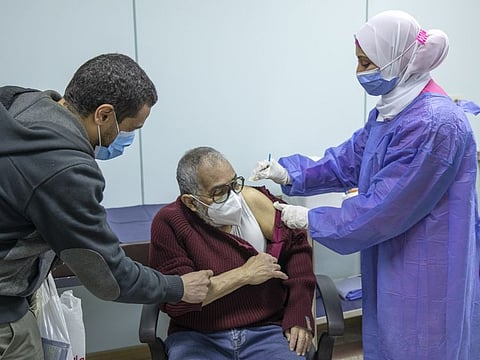 A man receives the AstraZeneca COVID-19 vaccine at Al Nozha Hospital in Cairo in a file photo.