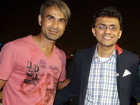 Imran Tahir (left), back in Dubai for IPL 2021 campaign, with Anis Sajan.