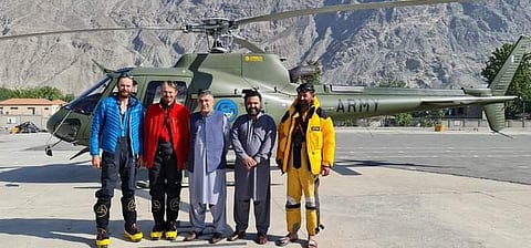 Two Czech climbers Peter Macek and Jakub Vicek and Pakistani mountaineer Wajidullah Nagri with the local authorities of Gilgit Baltistan after the successful rescue operation.