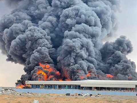 Civil Defence teams controlled the fire that broke out at a warehouse in the Umm Al Thuoub Industrial Area in Umm Al Quwain on Tuesday.