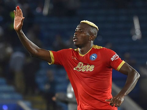 Napoli's Victor Osimhen celebrates after scoring his side's second goal during the Europa League Group C soccer match between Leicester City and Napoli at the King Power Stadium in Leicester, England, Thursday, Sept.16, 2021.