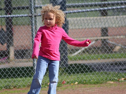 Jurnee Hoffmeyer before a classmate and a teacher cut her hair on separate occasions.