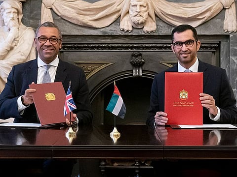 Left to Right: Rt Hon James Cleverly MP, UK Minister of State for Middle East and North Africa and Dr Sultan Al Jaber, UAE Minister of Industry and Advanced Technology and Special Envoy for Climate, at the signing ceremony.