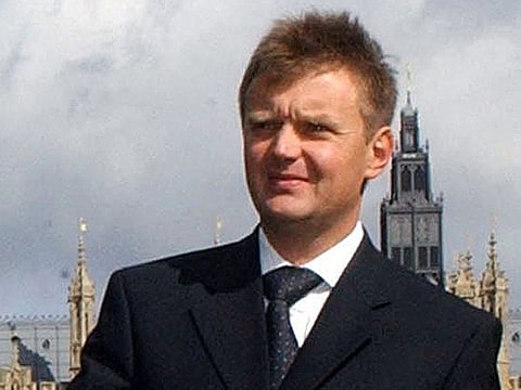 Alexander Litvinenko, a former Russian intelligence agent, posing for a photograph outside the House of Commons following a press conference in London in a 2014 file photo.