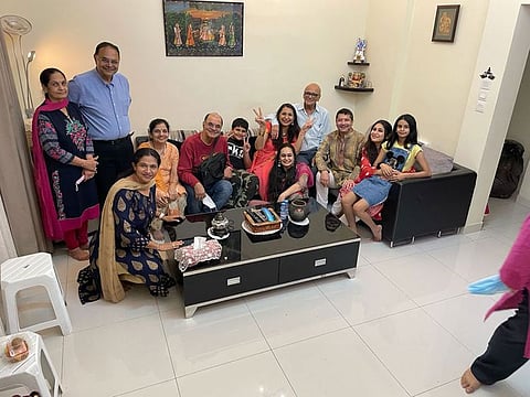 The Nensey brothers with their families in Muscat, Oman.