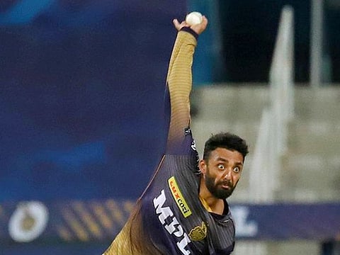 Varun Chakaravarthy of the Kolkata Knight Riders bowls against the Royal Challengers Bangalore during Match 31 of the Indian Premier League at the Zayed Cricket Stadium in Abu Dhabi on September 20, 2021.