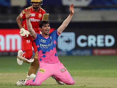 Kartik Tyagi of the Rajasthan Royals in action during the IPL match against the Punjab Kings at Dubai International Cricket Stadium on September 21, 2021.