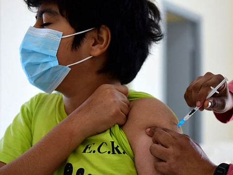 A minor receiving a dose of the Pfizer-BioNTech vaccine in Asuncion, Paraguay. All Indian children aged 12 or older will become eligible for COVID-19 vaccinations from next month, when drug maker Cadila Healthcare launches its ZyCoV-D product, two sources with direct knowledge of the matter told Reuters.