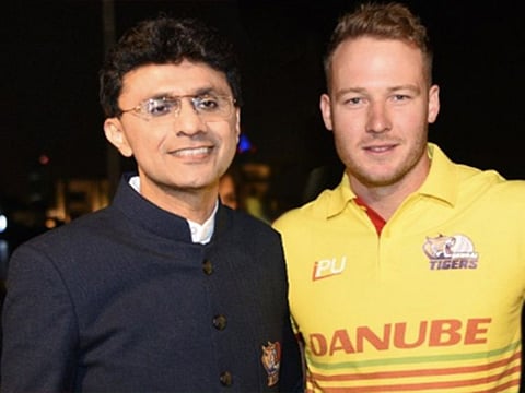 Anis Sajan with David Miller.