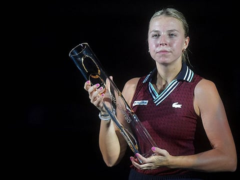 Estonia's Anett Kontaveit poses with her trophy after winning against Greece's Maria Sakkari 6-2, 7-5 during their final women's singles match of the Ostrava Open WTA tennis tournament in Ostrava, Czech Republic, on September 26, 2021.