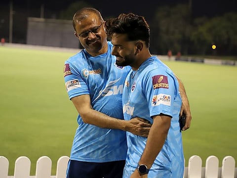 Hand around their shoulders: Colonol Vinod Bisht (left), the interim CEO of Delhi Capitals, with his skipper Rishabh Pant during a practice session in Delhi.