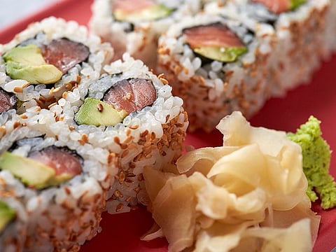 Uramaki - an inside out rolled sushi is one of the five different types of traditional sushi
