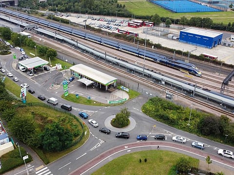 An aerial view shows customers queueing in their cars to access an Asda petrol station in east London.
