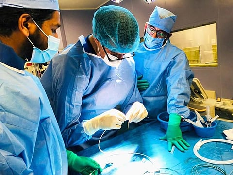 The team of doctors that operated upon Marwan Abdulla Soliman Mohammad, an eight-year old boy.