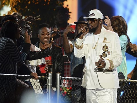FILE - In this Friday, Nov. 6, 2015, file photo, R. Kelly performs at the 2015 Soul Train Awards at the Orleans Arena in Las Vegas. A federal jury in New York convicted the R&B superstar Monday, Sept. 27, 2021, in a sex trafficking trial. (Photo by Al Powers/ Powers Imagery/Invision/AP, File)