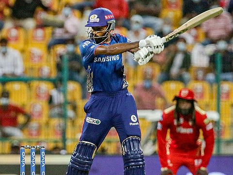 Hardik Pandya of the Mumbai Indians cuts during the Indian Premier League match against the Punjab Kings in Abu Dhabi on September 28, 2021.