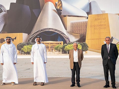 Sheikh Khaled bin Mohamed bin Zayed Al Nahyan and Frank Gehry, among others, at the Guggenheim Abu Dhabi museum site on Saadiyat Island.