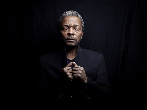 Curator Simon Njami.