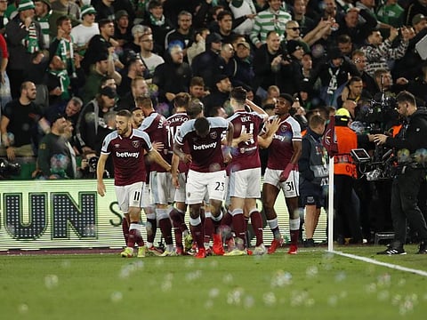 West Ham United's Declan Rice celebrates scoring their first goal with teammates at the London Stadium, London during the Europa League Group H match against Rapid Vienna.