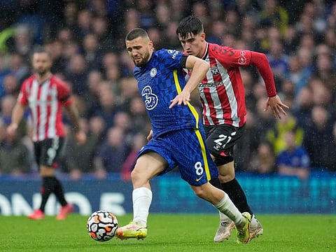 Chelsea's Mateo Kovacic (left) duels for the ball with Southampton's Tino Livramento during the English Premier League match at Stamford Bridge Stadium in London.