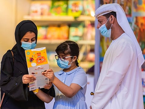 Visitors at a previous edition of the book fair, said to be the third-biggest in the world, browsing a title