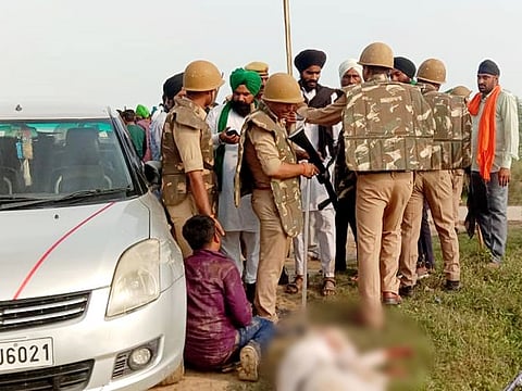 Security personnel at the spot after violence broke out after farmers agitating were allegedly run over by a vehicle in the convoy of a union minister, in Lakhimpur Kheri on Sunday.
