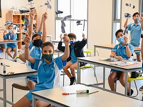 Students showing their ideas for the life-on-moon project