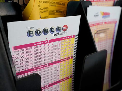 Blank forms for the Powerball lottery sit in a bin at a local grocery store, in Des Moines, Iowa.