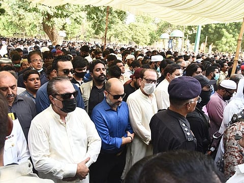 Sindh Governor Imran Ismail and others at the funeral prayers of late Umer Sharif in Karachi.