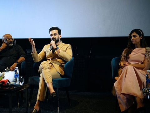 Prithviraj and Mamta Mohandas with director Ravi in Dubai