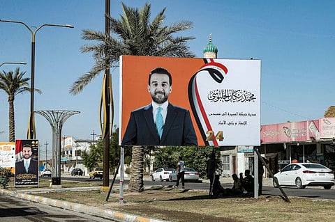 An electoral campaign billboard depicts parliament speaker Mohammad Al Halbussi in Ramadi, the capital of Iraq's central Anbar Governorate.