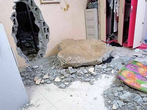 According to Sabq, a huge rock fell into the room of the 19-year-old from a building overlooking his house in Al Laith governorate.