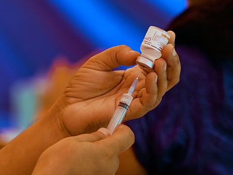 A health worker prepares a dose of Covaxin at a vaccination centre in New Delhi in a file photo.